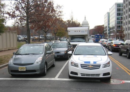 GM Volt and Toyota Prius on streets of Washington D. C.